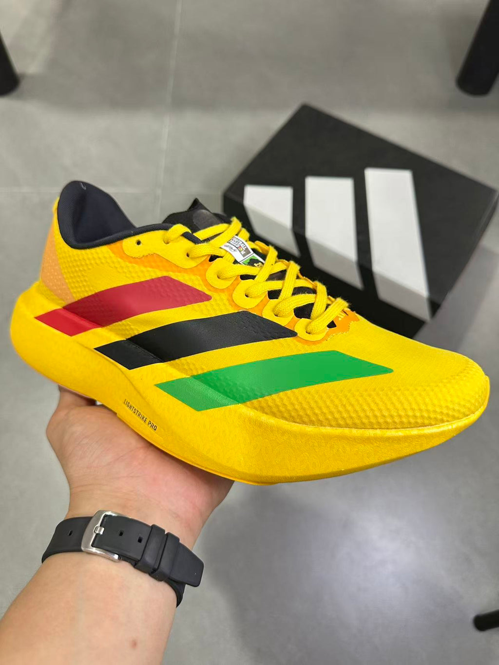 adidas Lightstrike Pro Running Shoes in Yellow KJ3625 - product image from the listing.