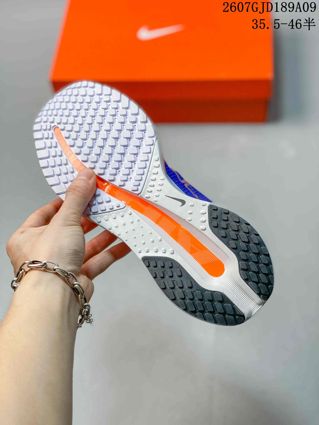 Nike Vomero Premium Running Shoes in Blue - product image from the listing.