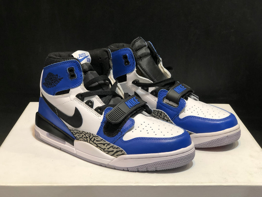 Jordan Legacy 312 High-Top Sneakers in White Blue AQ4160-104 - product image from the listing.