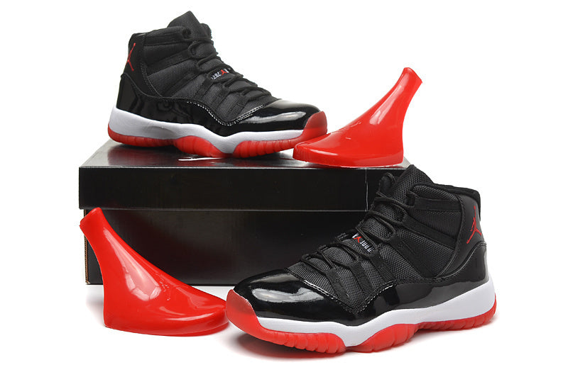 Air Jordan 11 Retro High Basketball Sneakers in Black Red - product image from the listing.
