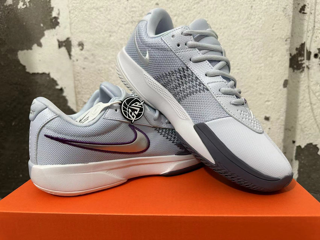 Gray and Purple Nike Ja 1 Basketball Shoes - product image from the listing.