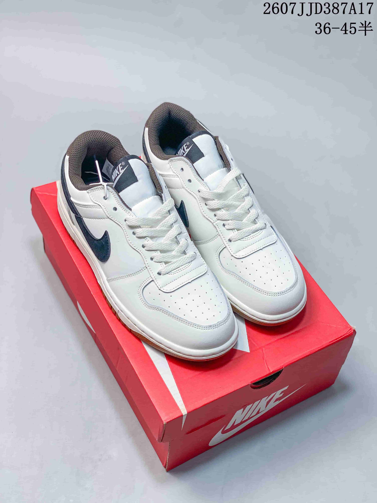 Nike Big Nike Low Sneakers in Black, Green, in White and Navy - product image from the listing.