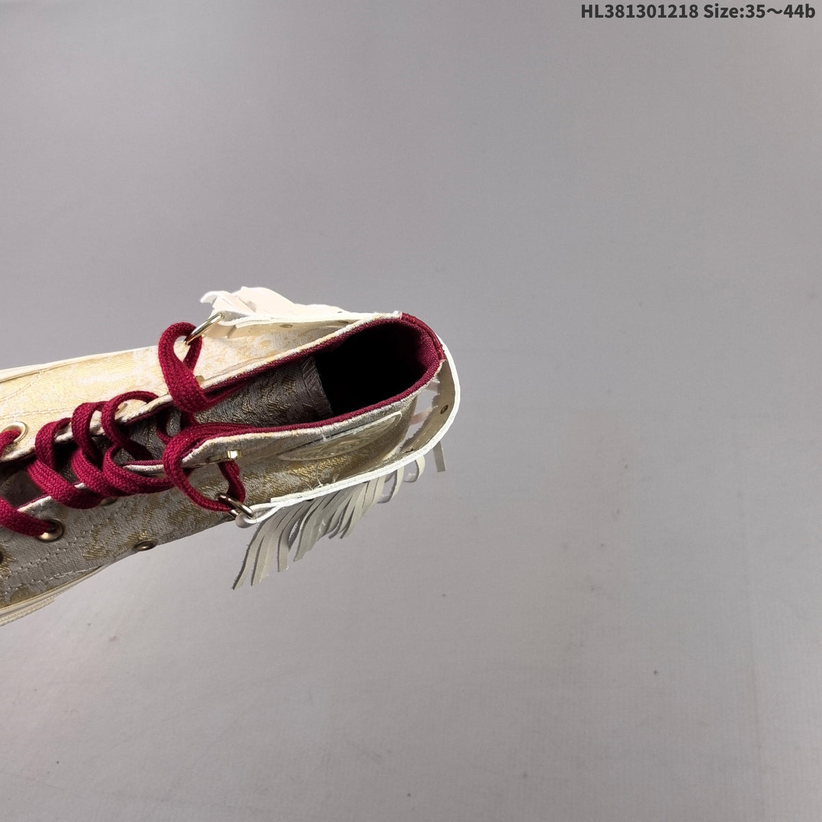 Converse Chuck 70 High-Top Sneakers, in Gold and Burgundy - product image from the listing.