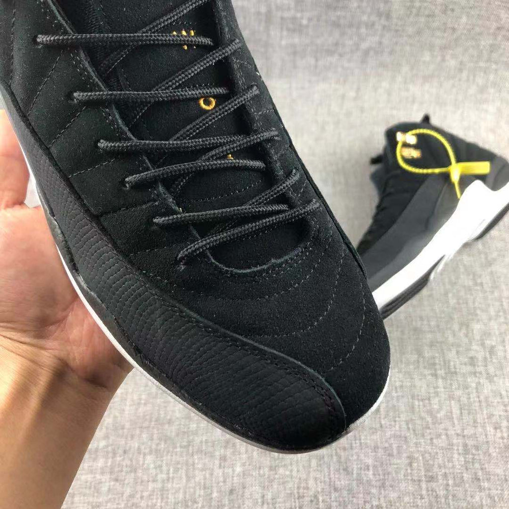 Air Jordan 12 Black Gold Sneakers 130690-017 - product image from the listing.
