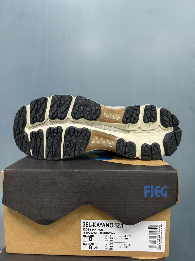 Nike Zoom Vomero 5 Sneakers in Beige White Brown 1203B144-100 - product image from the listing.