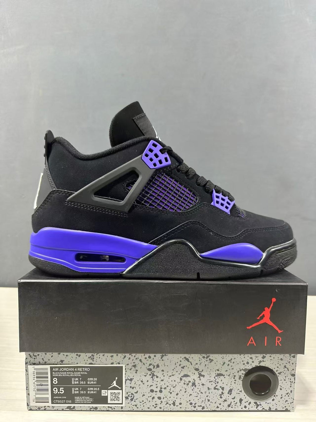 Air Jordan 4 Retro Black Blue Sneakers CT8527-018 - product image from the listing.