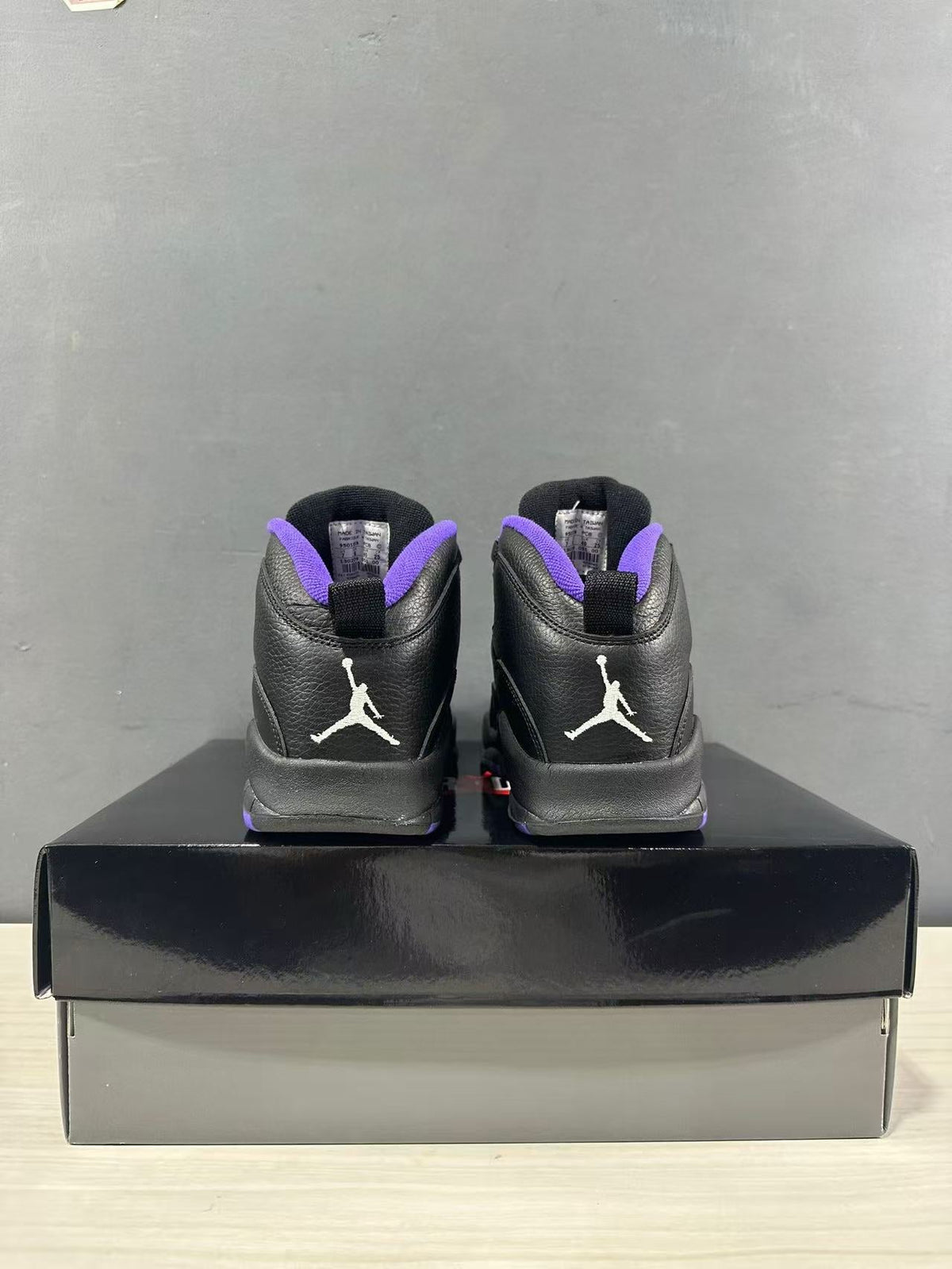 Air Jordan 10 High-Top Sneakers Black Purple 130209-051 - product image from the listing.