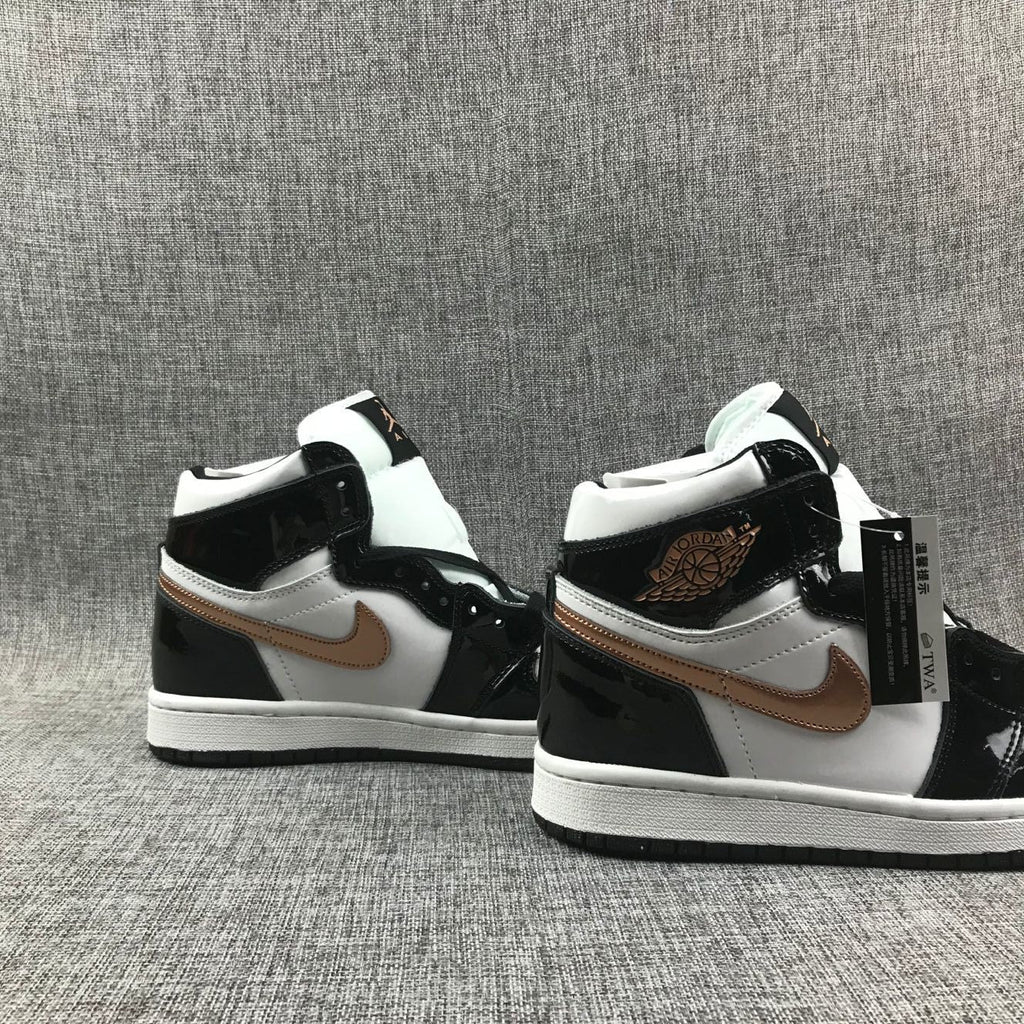 Air Jordan 1 Mid Sneakers in Black White Metallic Gold 852542-007 - product image from the listing.