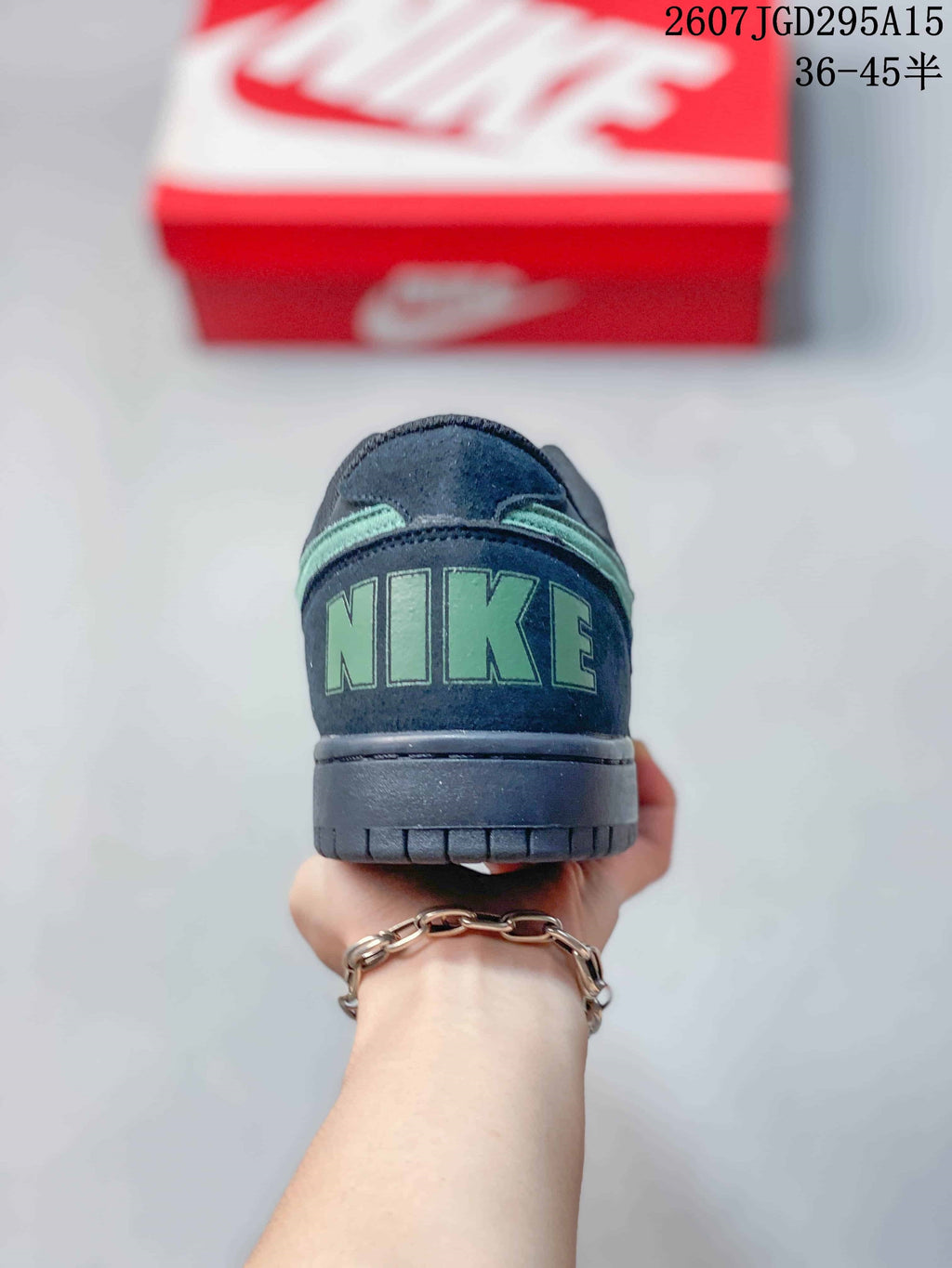 Nike SB Dunk Low Pro Sneakers in Black Mint 2607TGD295A15 - product image from the listing.