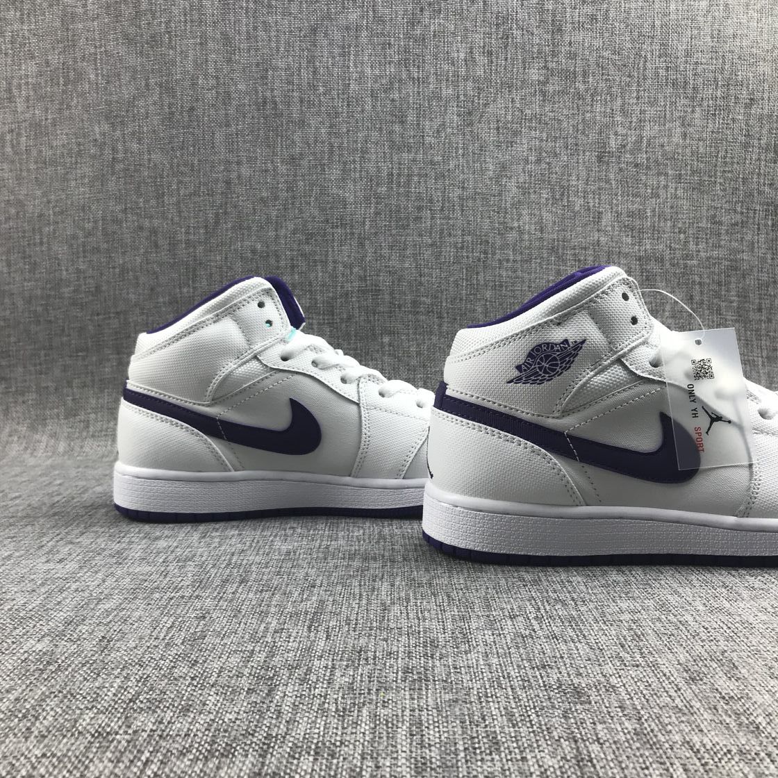 Air Jordan 1 Mid Sneakers in White Purple 332148-137 - product image from the listing.