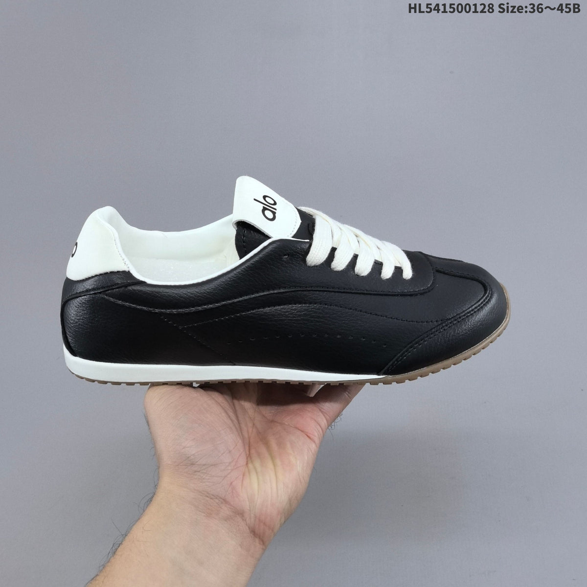White and Black Alo Yoga Sunset Sneaker Low-Top - product image from the listing.