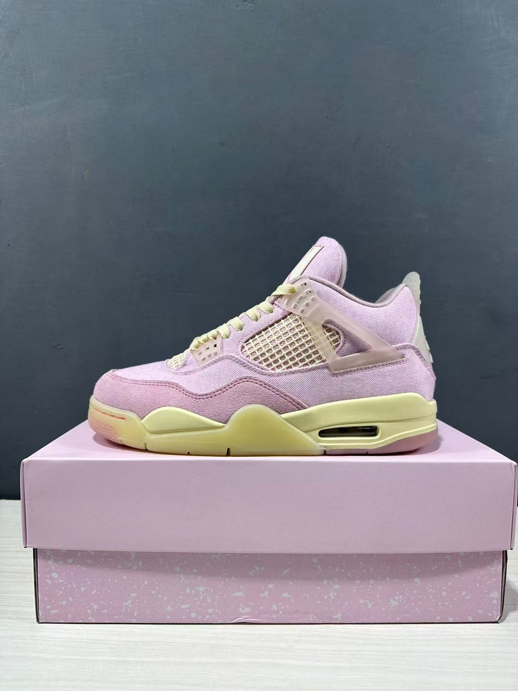 Air Jordan 4 Retro Pink Sneakers IB6716-600 - product image from the listing.
