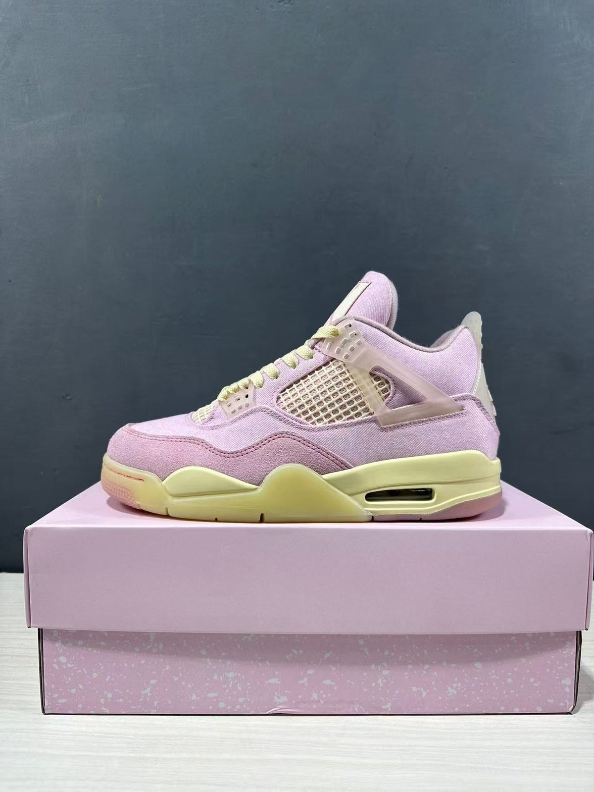 Air Jordan 4 Retro Pink Sneakers IB6716-600 - product image from the listing.