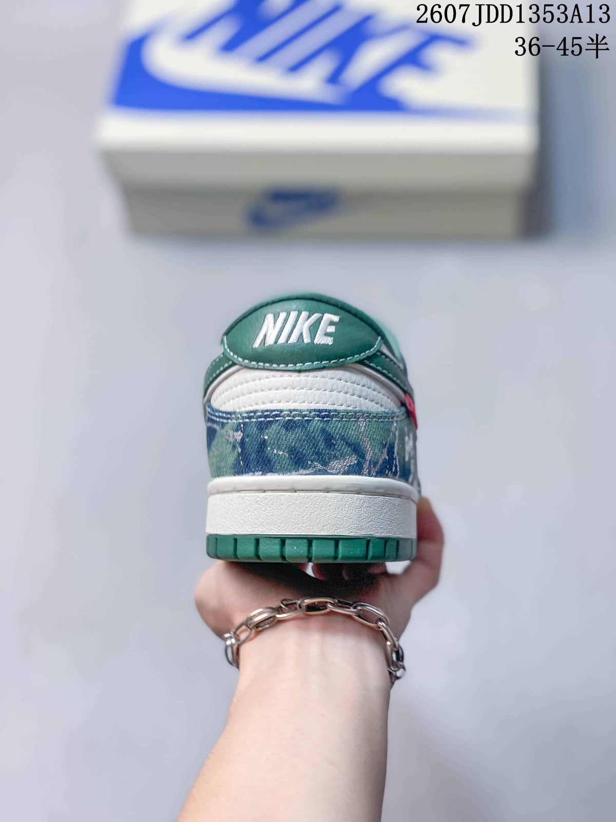 Nike SB Dunk Low in Blue Green White JDD1353A13 - product image from the listing.