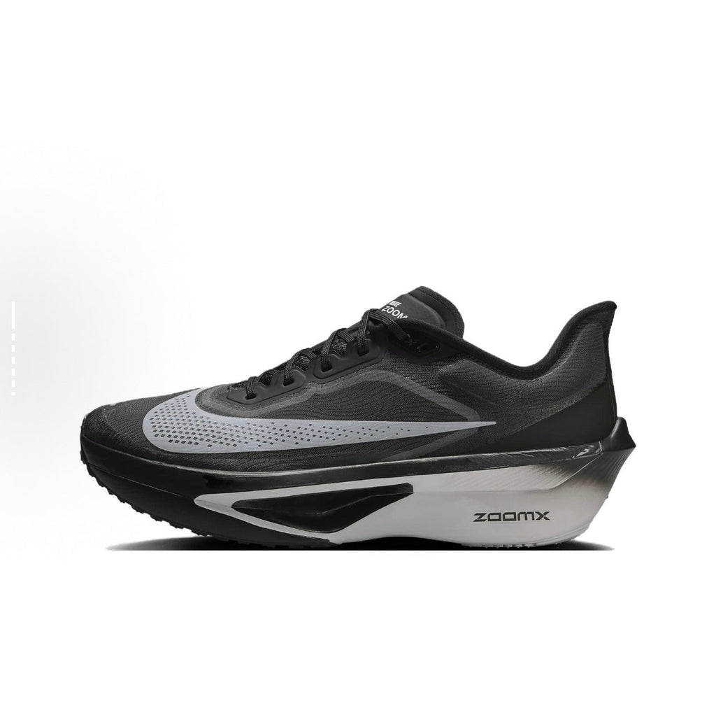 Black and White Nike Zoom Fly Running Shoes - product image from the listing.