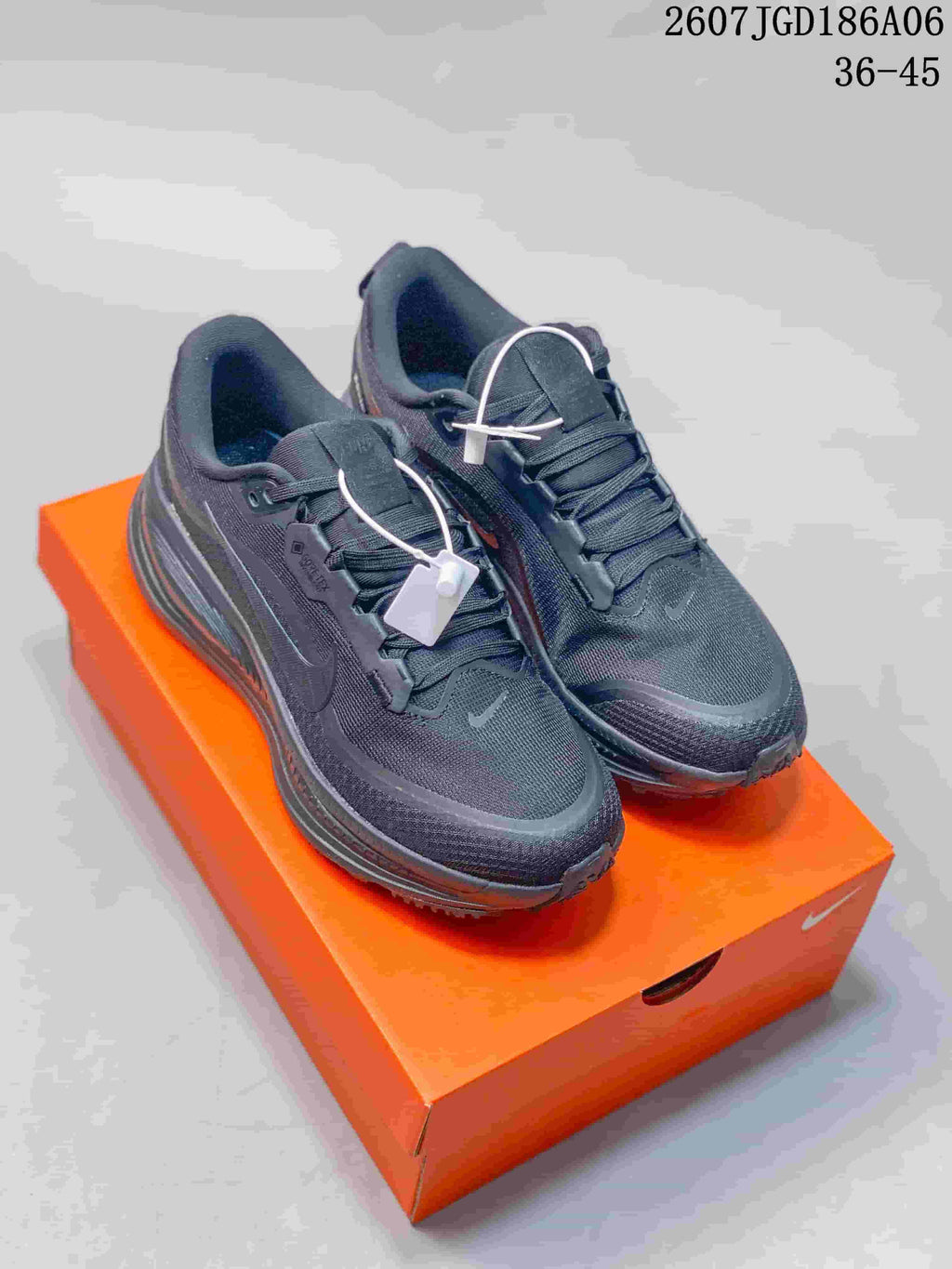 Nike Vomero Plus Running Shoes in Black 2607TGD186A06 - product image from the listing.