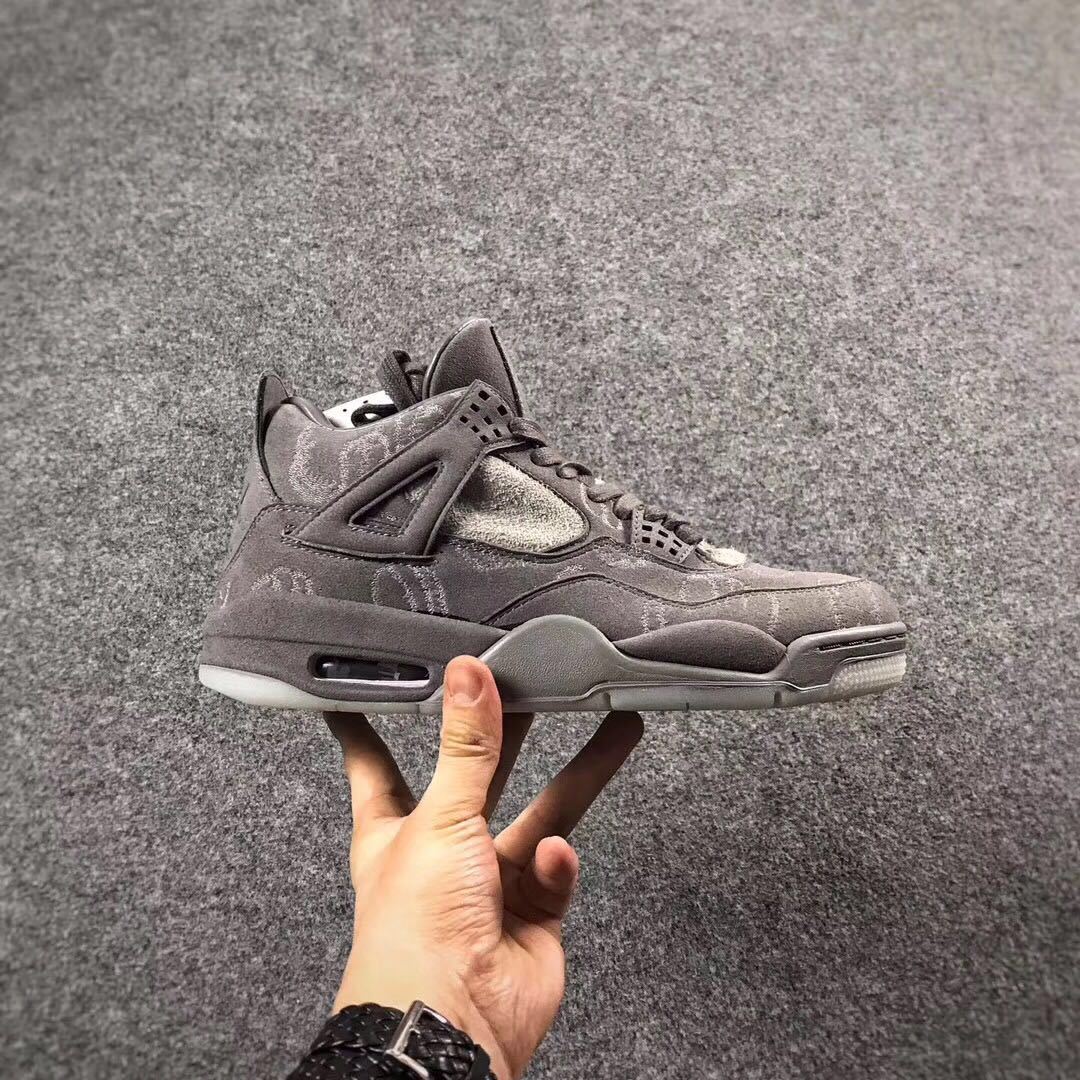 Grey Jordan 4 KAWS Sample High-Top Sneakers - product image from the listing.