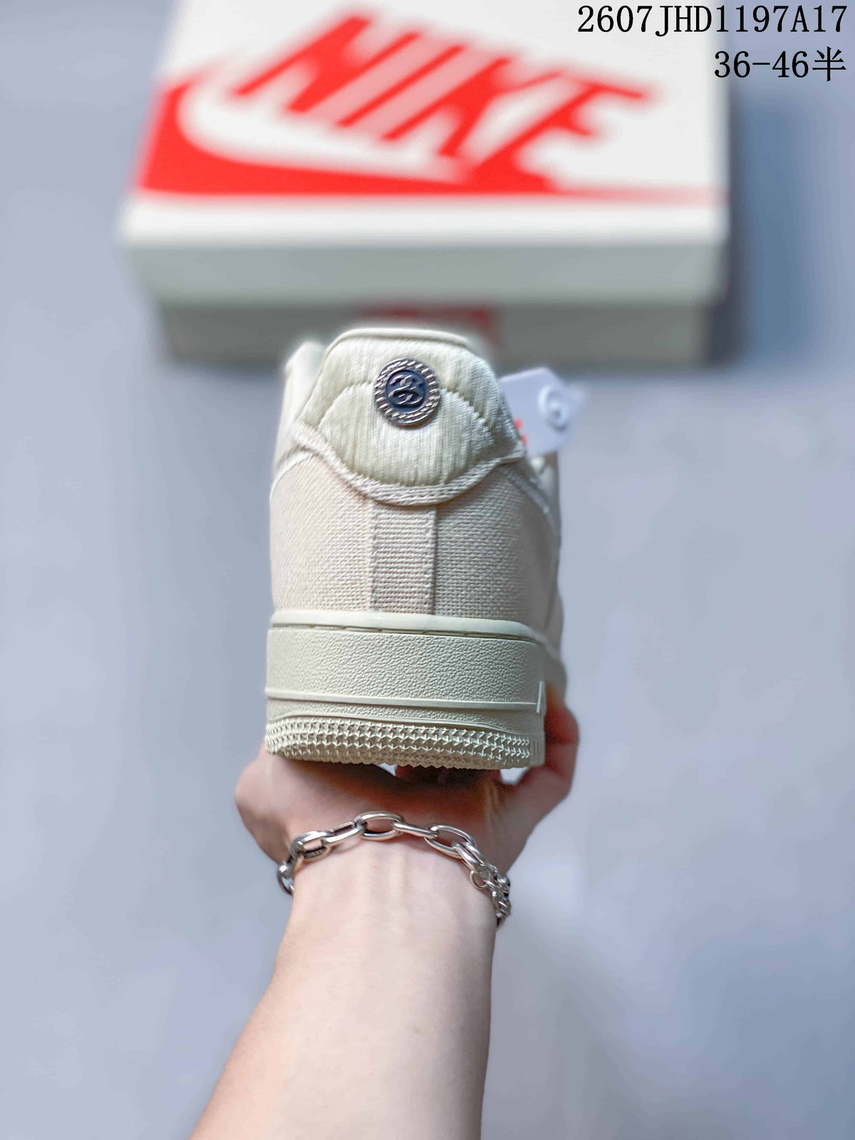Stussy x Nike Air Force 1 '07 Cream Woven Trainers - product image from the listing.