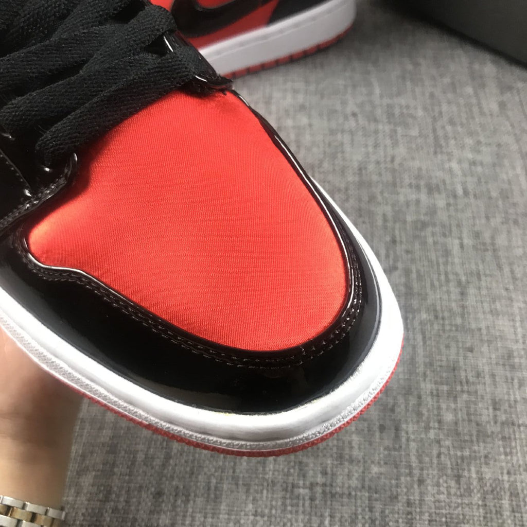 Air Jordan 1 Mid Sneakers in Black Red White BQ6472-600 - product image from the listing.