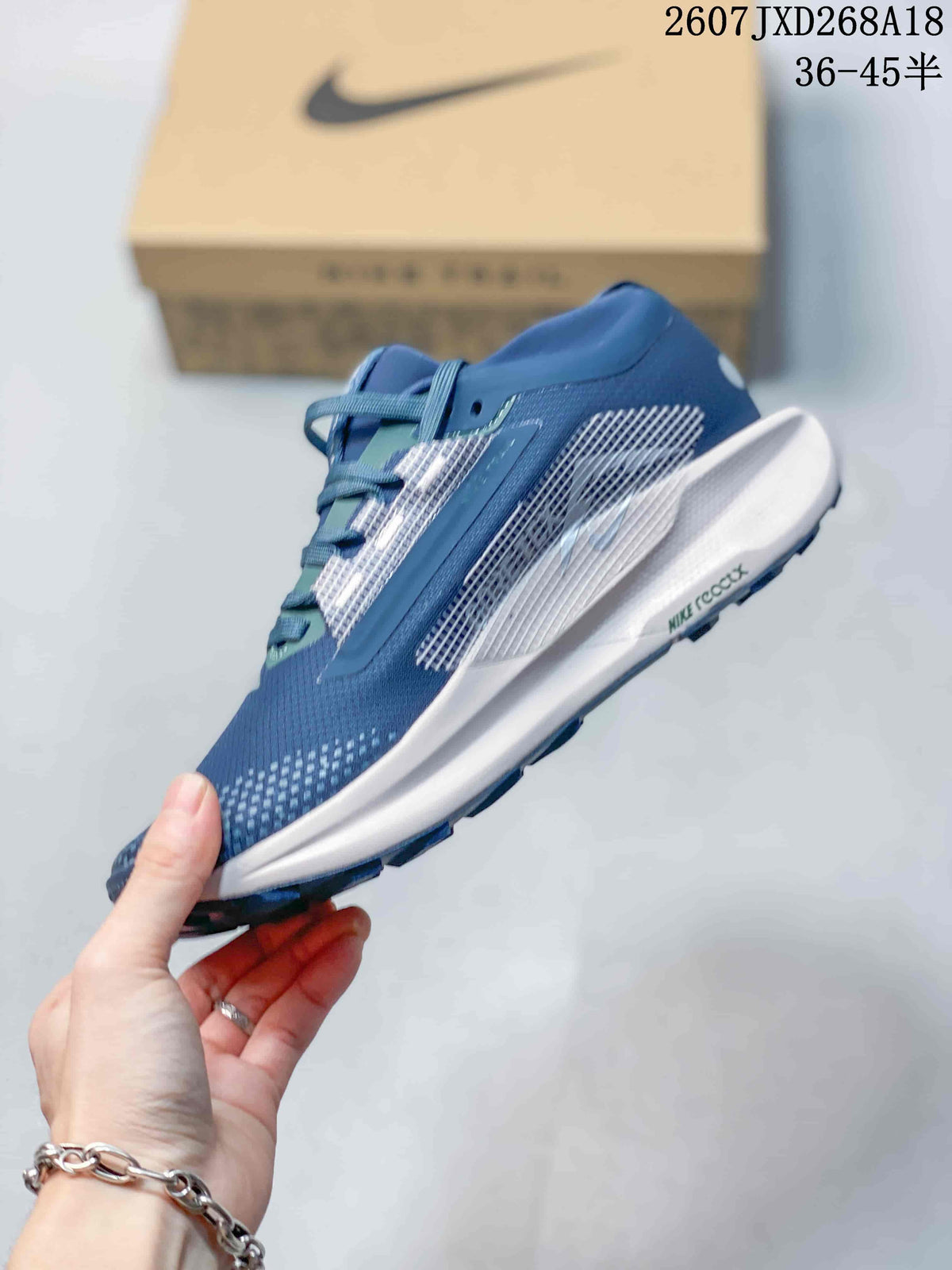 Nike Pegasus Trail 5 GORE-TEX Sneakers in Blue 07JXD268A18 - product image from the listing.