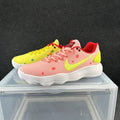 Pink and Yellow Nike Mismatched Color Sneakers - product image from the listing.