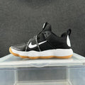 Nike Black and White Trainers with Gum Sole - product image from the listing.