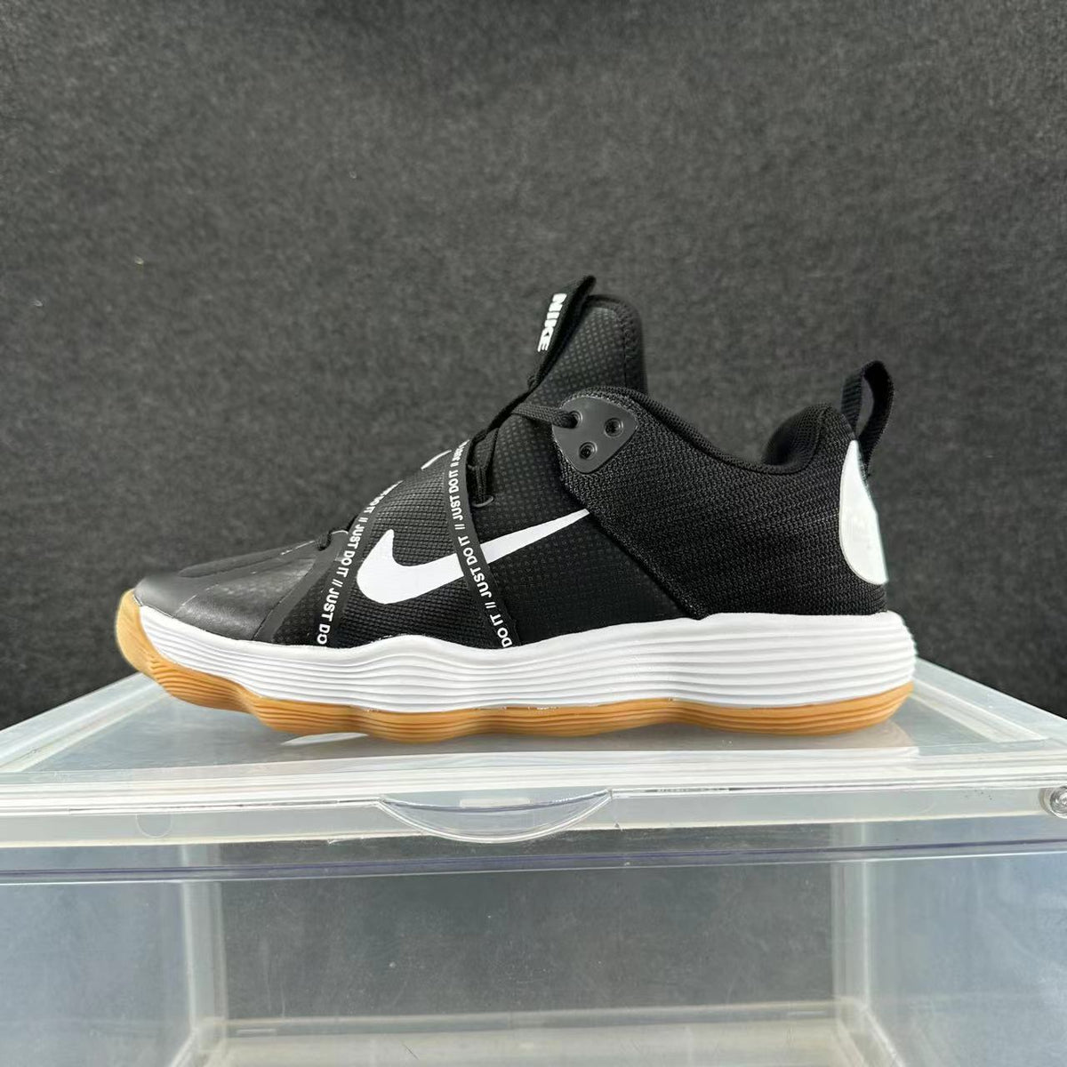 Nike Black and White Trainers with Gum Sole - product image from the listing.