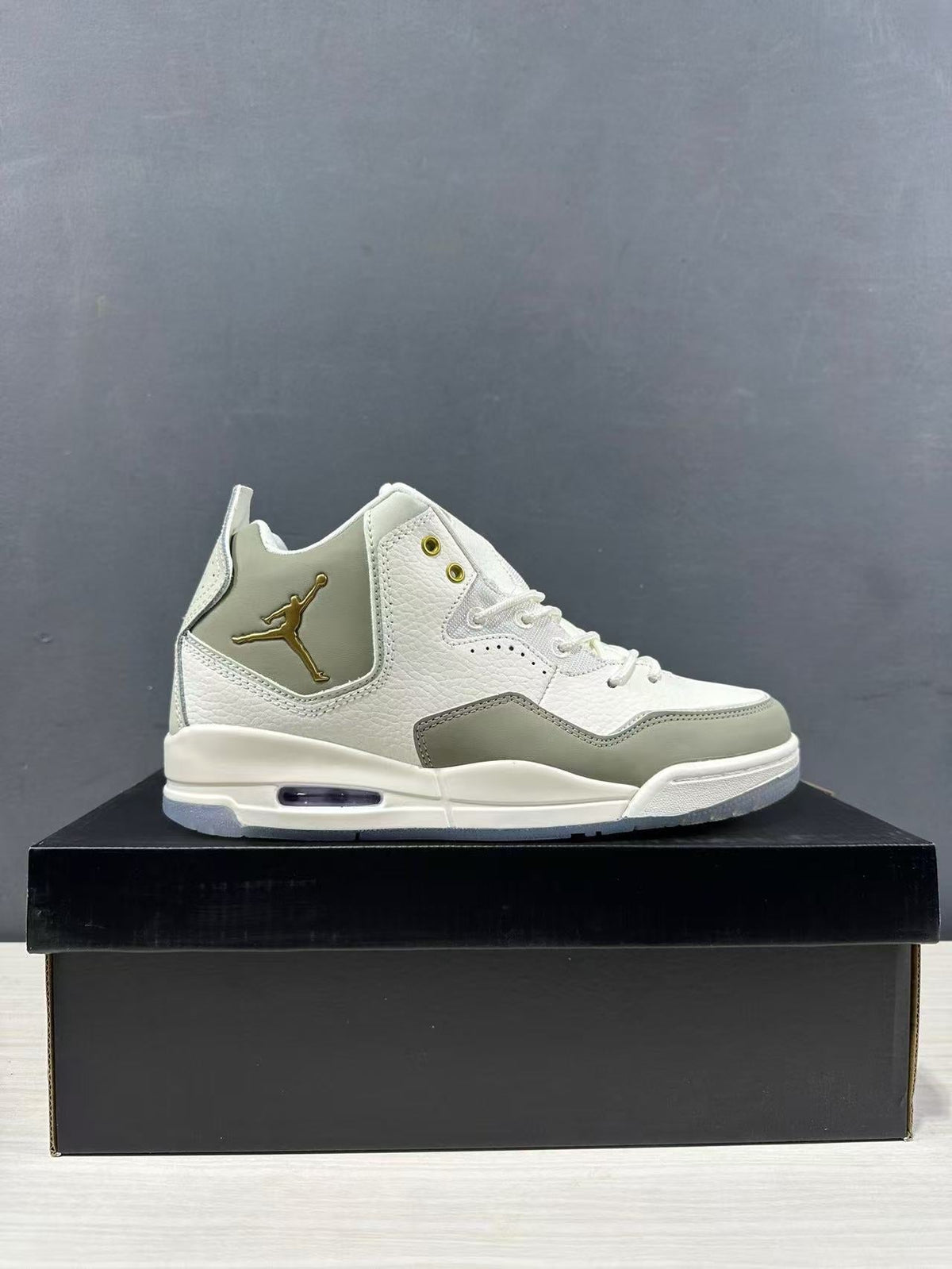 Jordan Courtside 23 High-Cut Sneakers Off-White/Tan IQ9783-171 - product image from the listing.