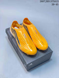 F50 Elite Yellow Black Laceless Soccer Cleats by adidas - product image from the listing.