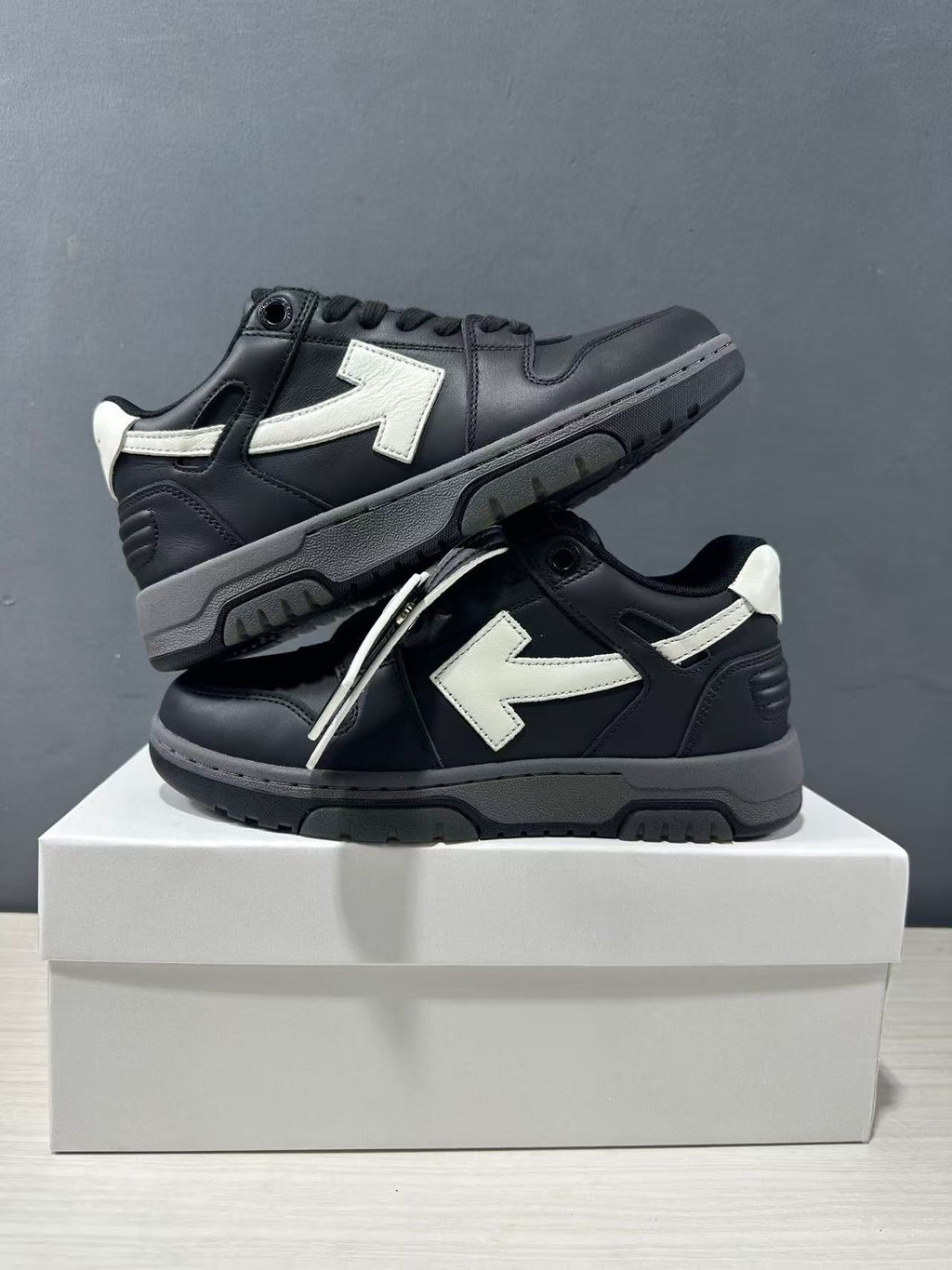 Off-White Out Of Office Low-Top Sneakers in Black White OWIA189C99LEA0061001 - product image from the listing.