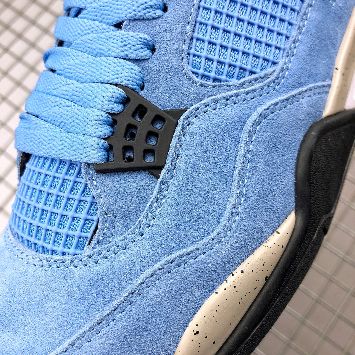 Air Jordan 4 University Blue Sneakers CT8527-400 - product image from the listing.