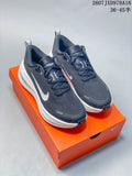 Nike Vomero Plus Running Sneakers in Dark Gray White 2607JXD978A18 - product image from the listing.