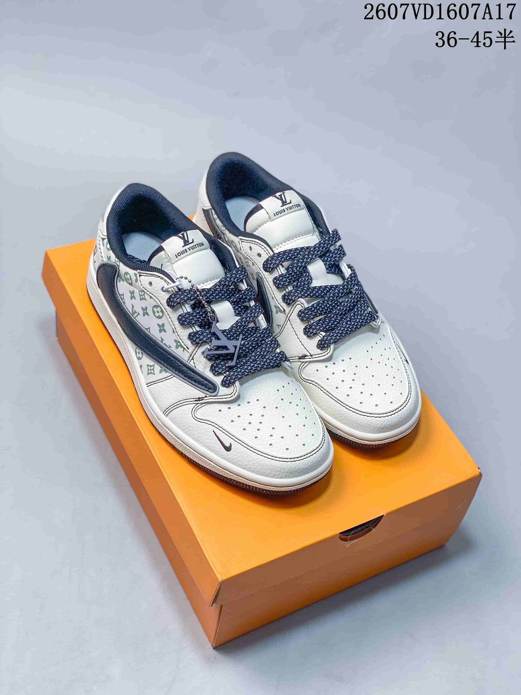 White Navy Monogram Sneakers - Jordan 1 Low - product image from the listing.