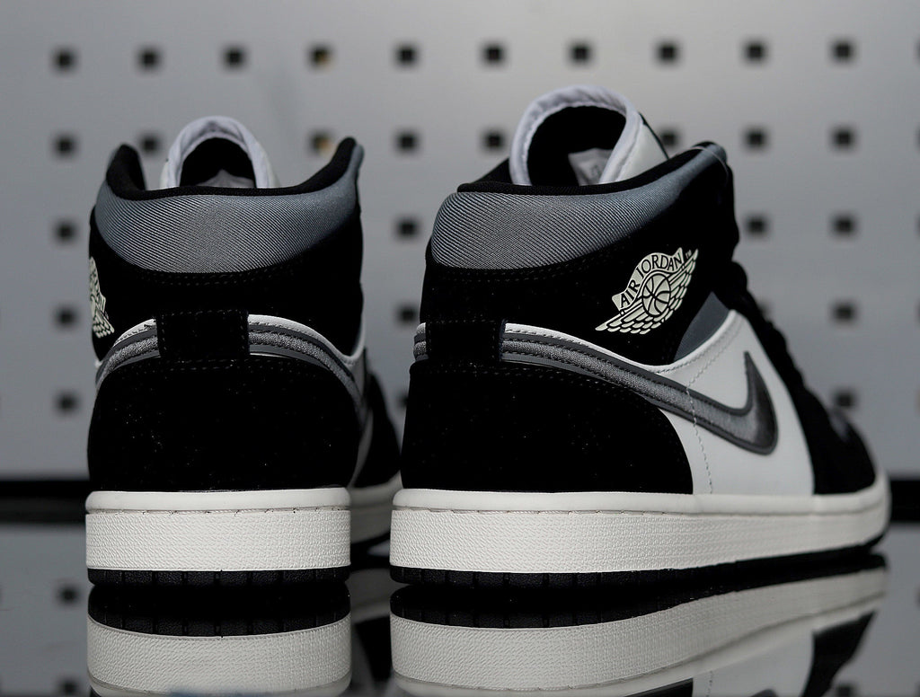 Jordan 1 Retro High OG Sneakers in Black White 852542-011 - product image from the listing.
