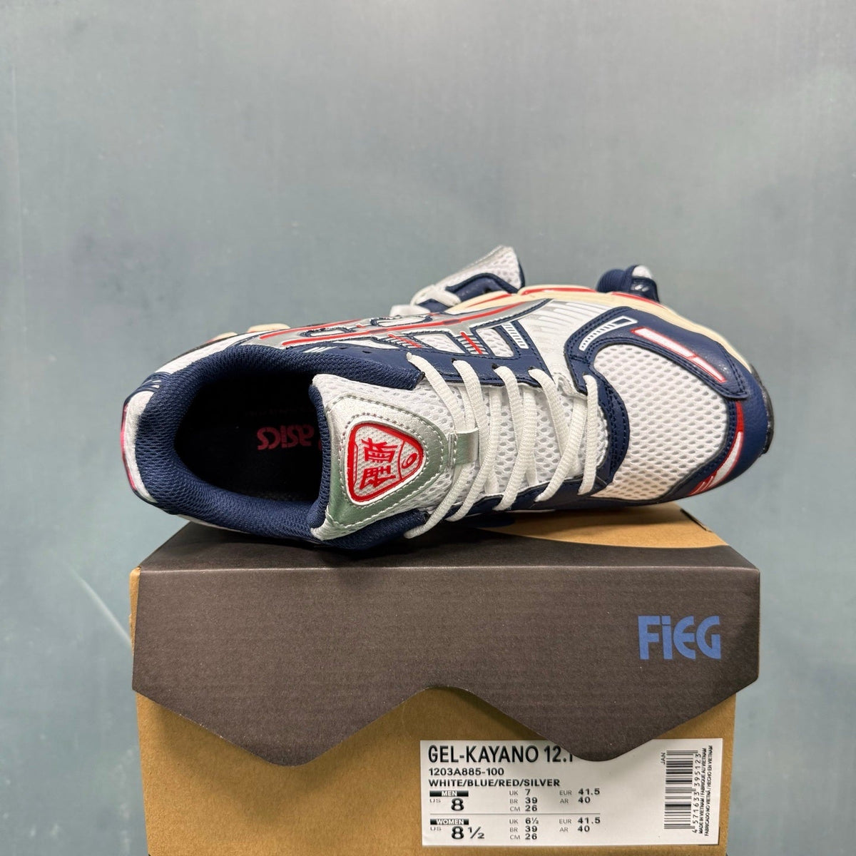 ASICS GEL-KAYANO 12.1 Sneakers in White Blue Red 1203A885-100 - product image from the listing.