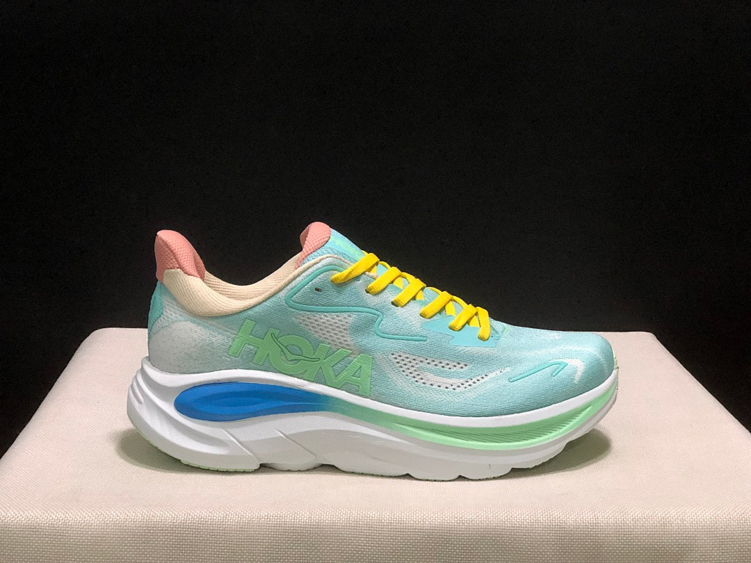 Aqua and Yellow HOKA Clifton 10 Running Shoes - product image from the listing.
