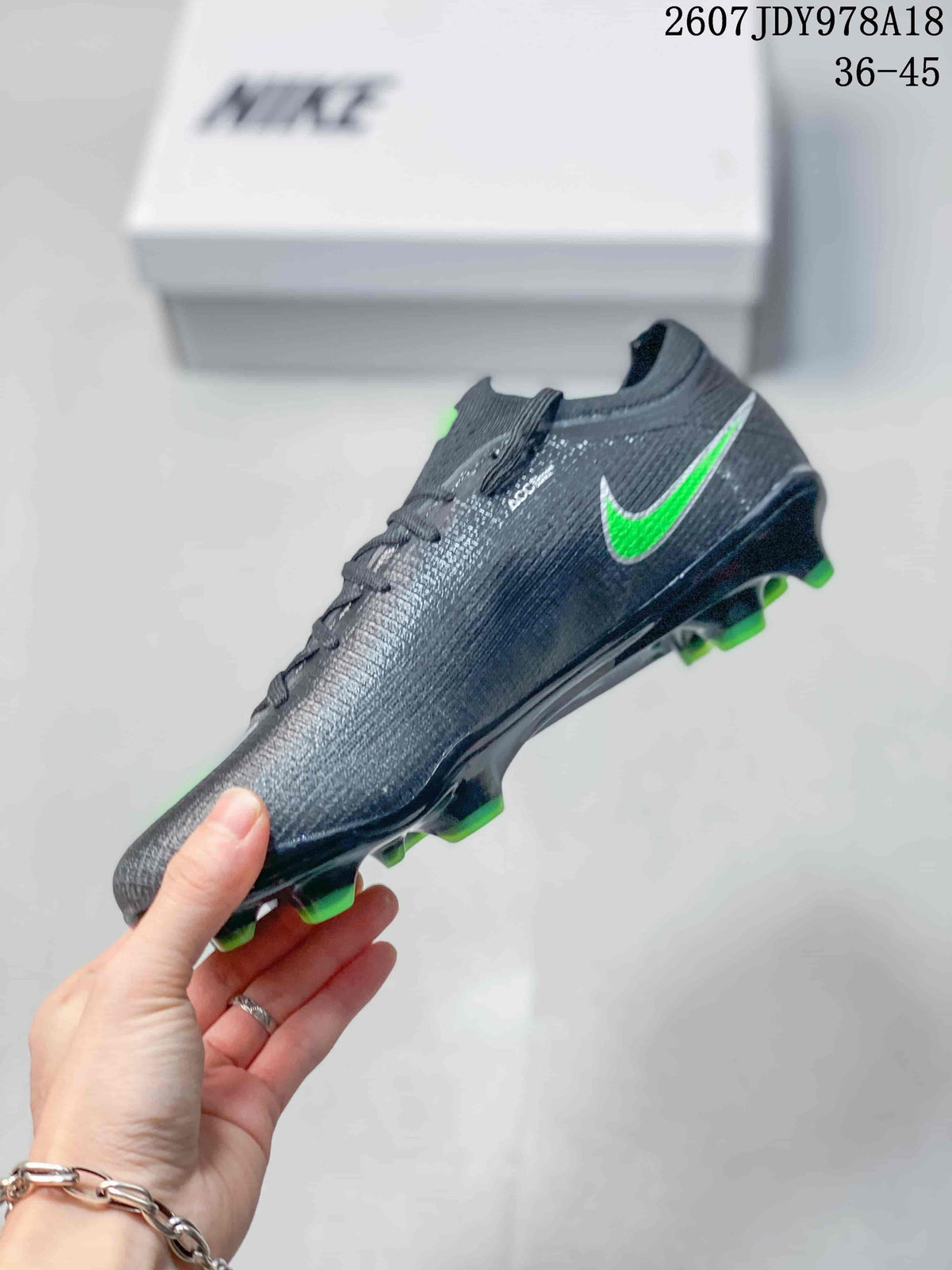 Nike Mercurial Vapor 16 Elite AG-PRO Soccer Cleats in Black Green - product image from the listing.