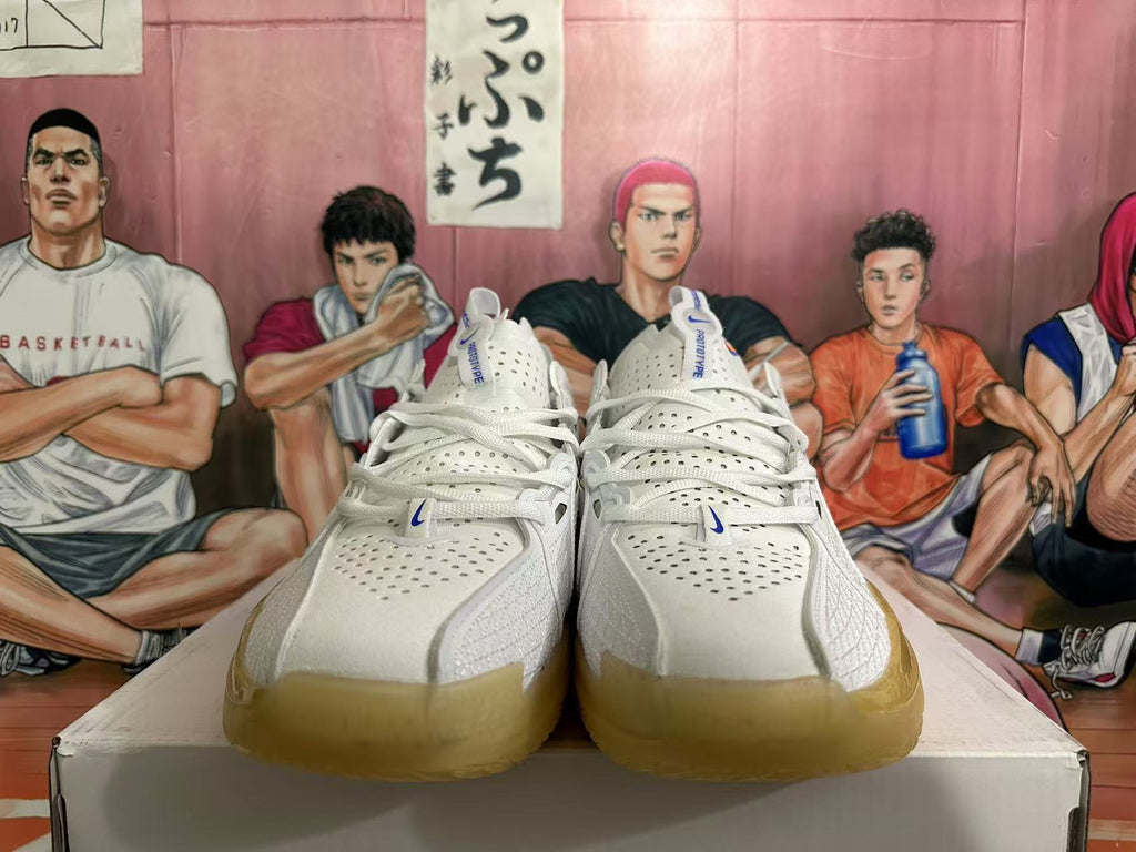 Nike ZoomX Basketball Sneakers in White Blue Orange - product image from the listing.