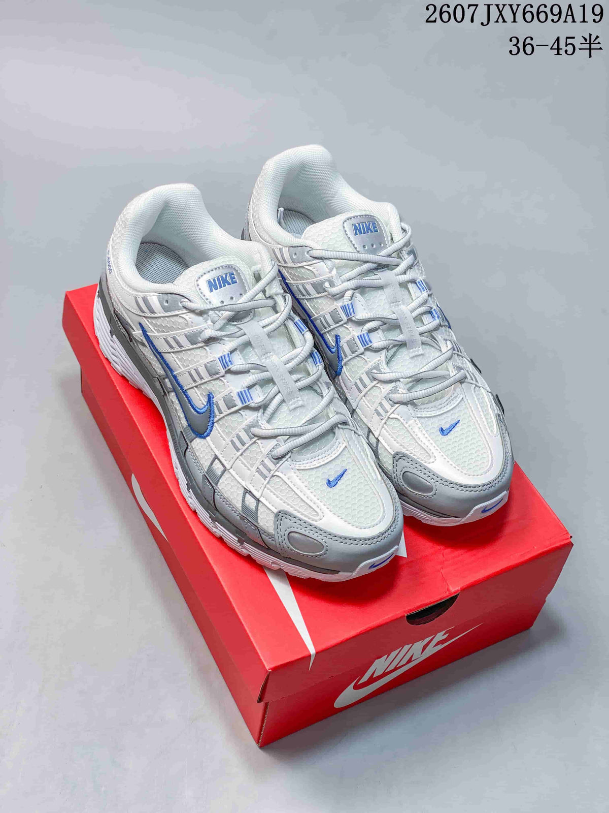 Nike P-6000 Retro Running Sneakers in White Grey Blue - product image from the listing.