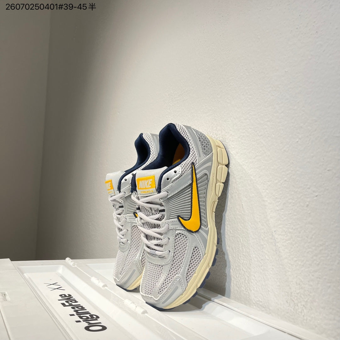 Nike Air Zoom Vomero 5 Running Shoes in White Grey Yellow - product image from the listing.
