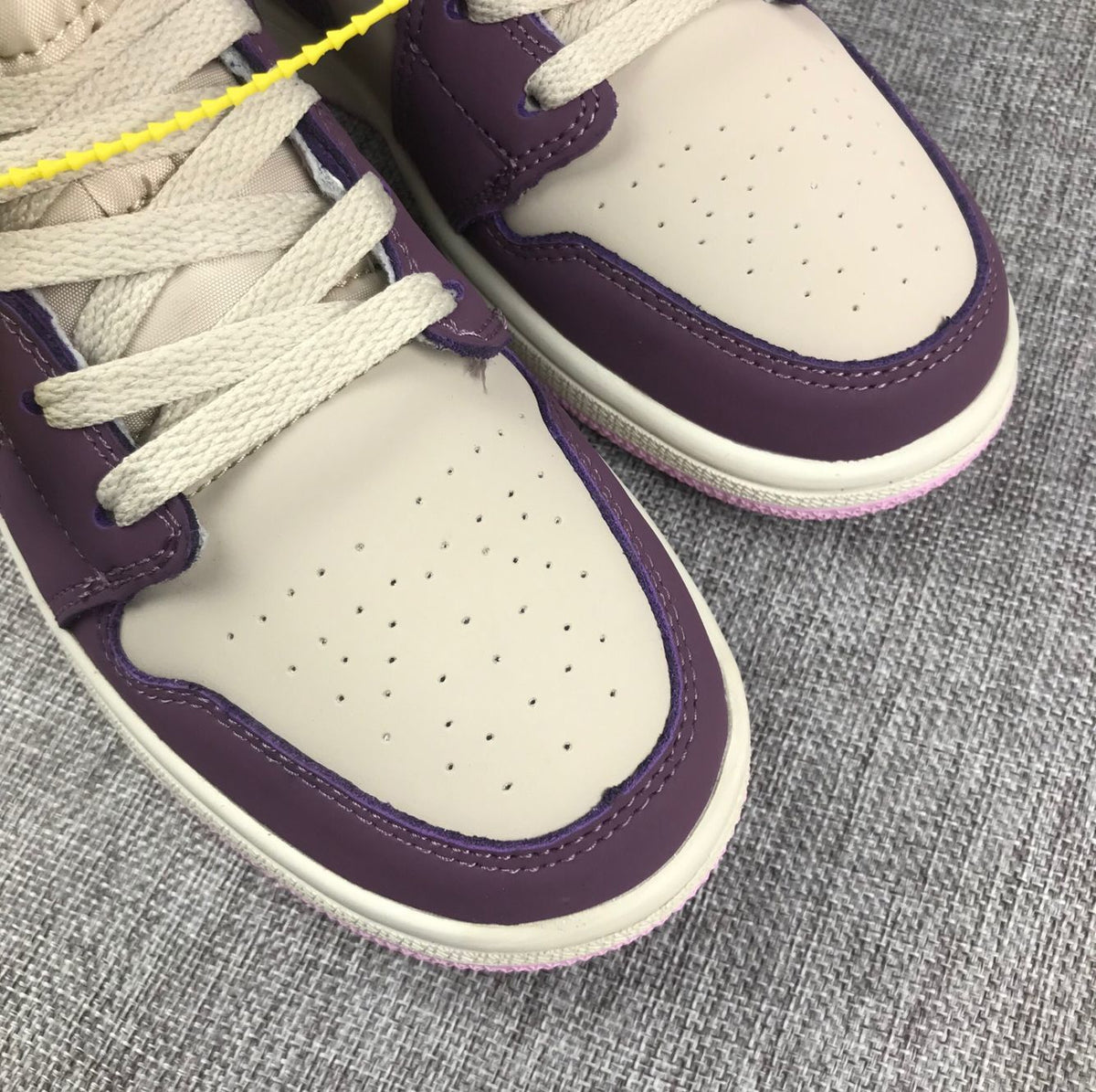 Air Jordan 1 Retro High OG Sneakers in White Purple - product image from the listing.