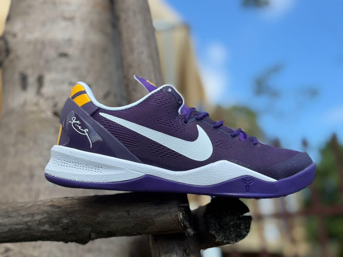 Nike Kobe 8 LSU Away Basketball Shoes, in Purple and Gold - product image from the listing.