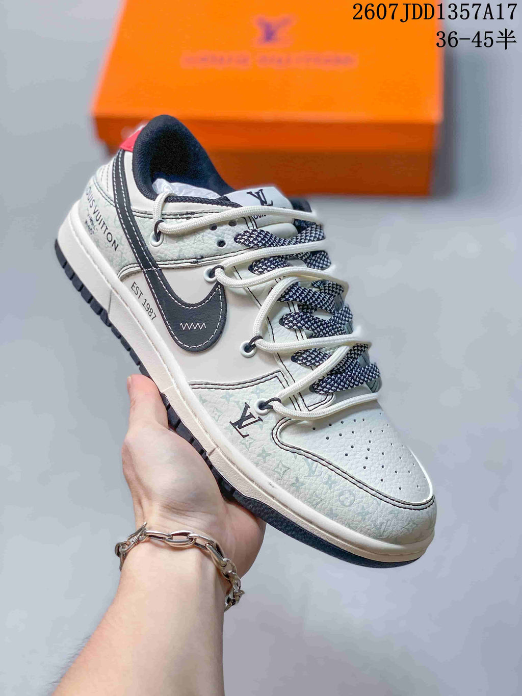 Nike SB Dunk Low White Black Double-Strap Trainers - product image from the listing.