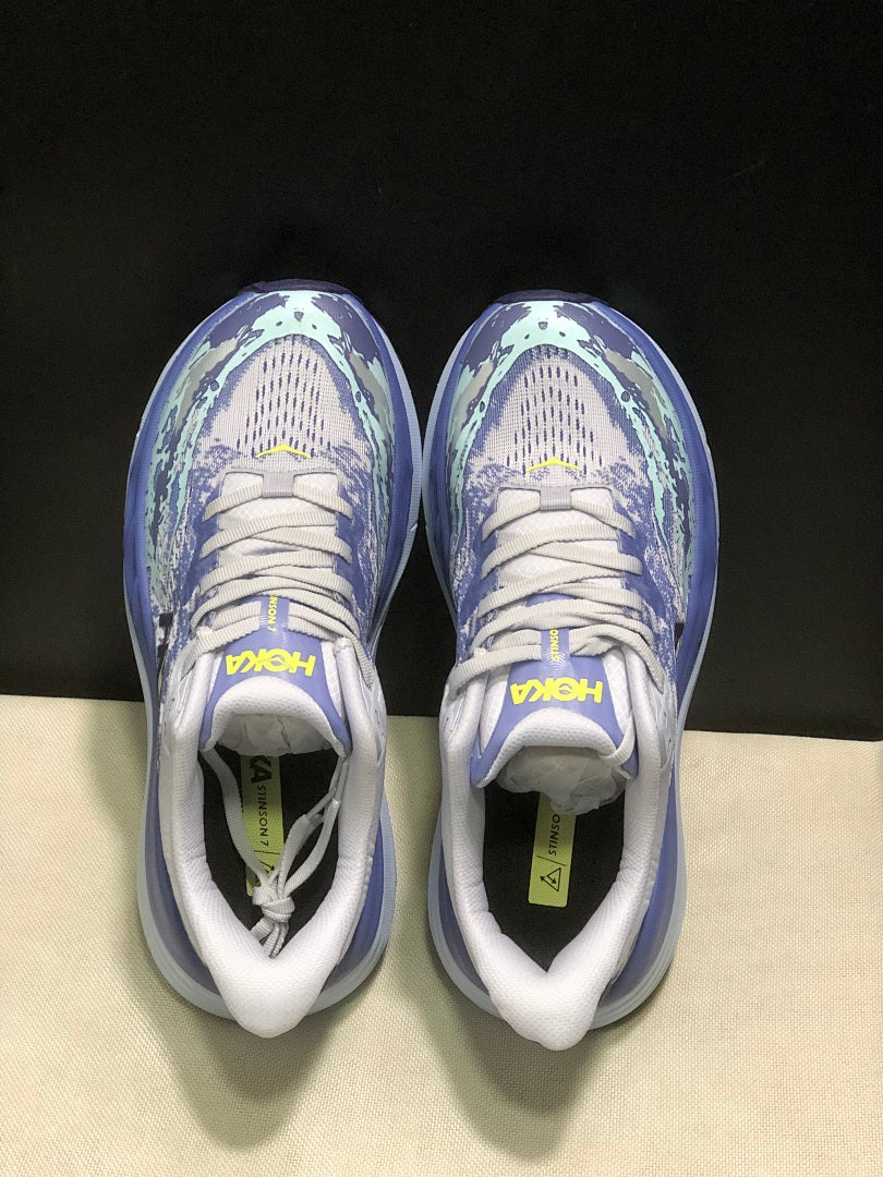 Purple and Mint HOKA Stinson 7 Running Shoes - product image from the listing.