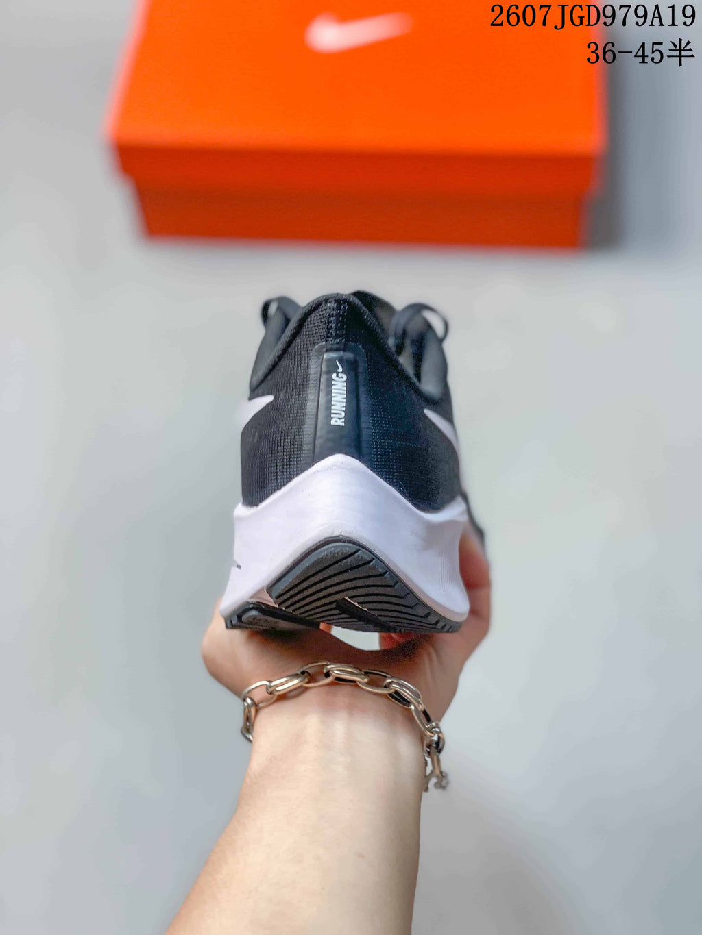 Nike Pegasus 37 Running Sneakers in Black and White - product image from the listing.