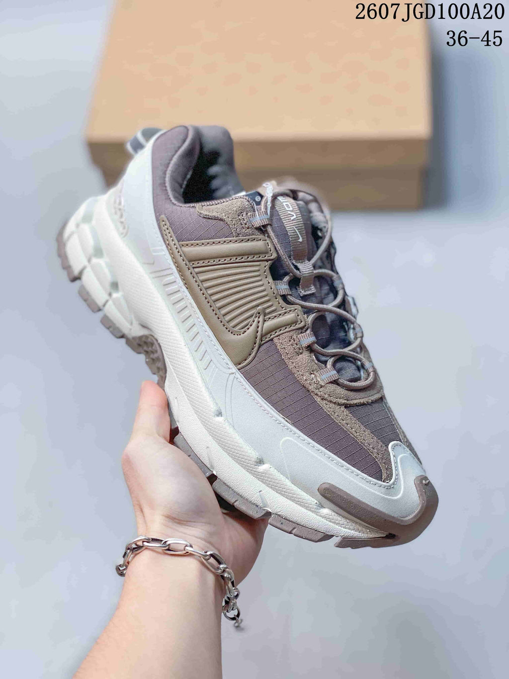 Nike Zoom Vomero Roam Sneakers in Taupe Gray 2607JGD100A20 - product image from the listing.