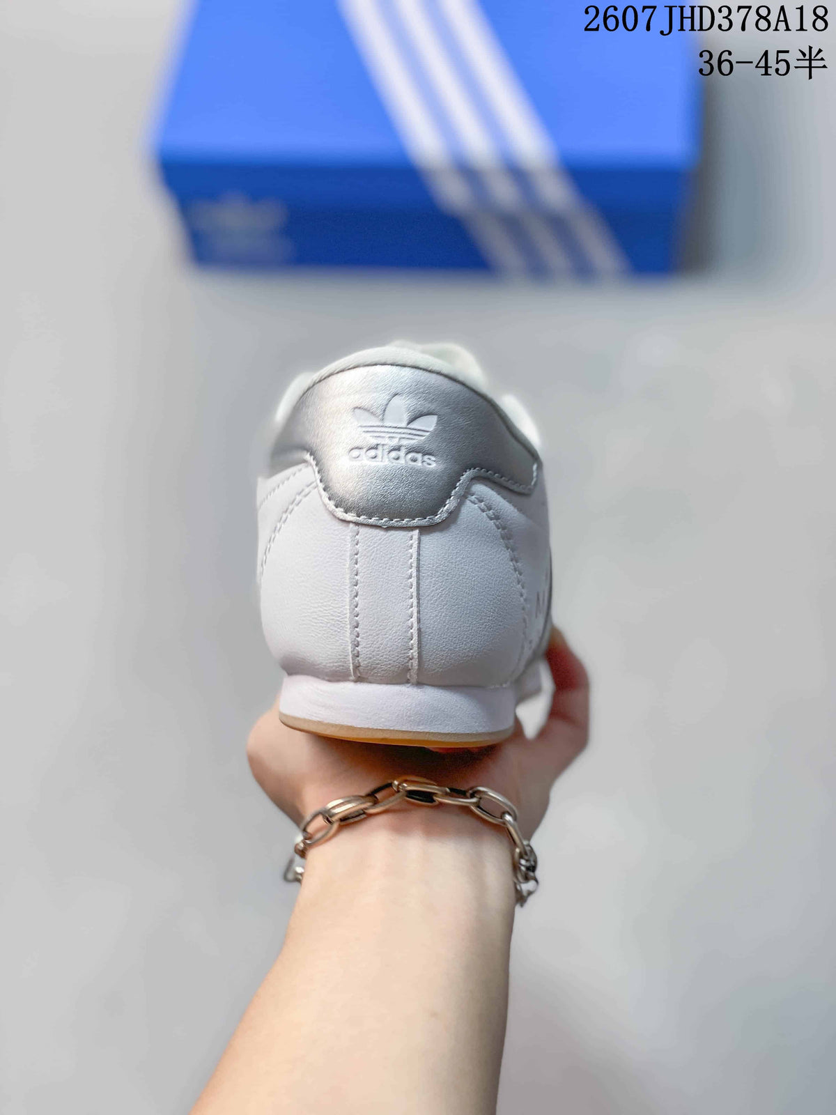 adidas Taekwondo SMIL-LS Low-Top Sneakers in White Silver - product image from the listing.