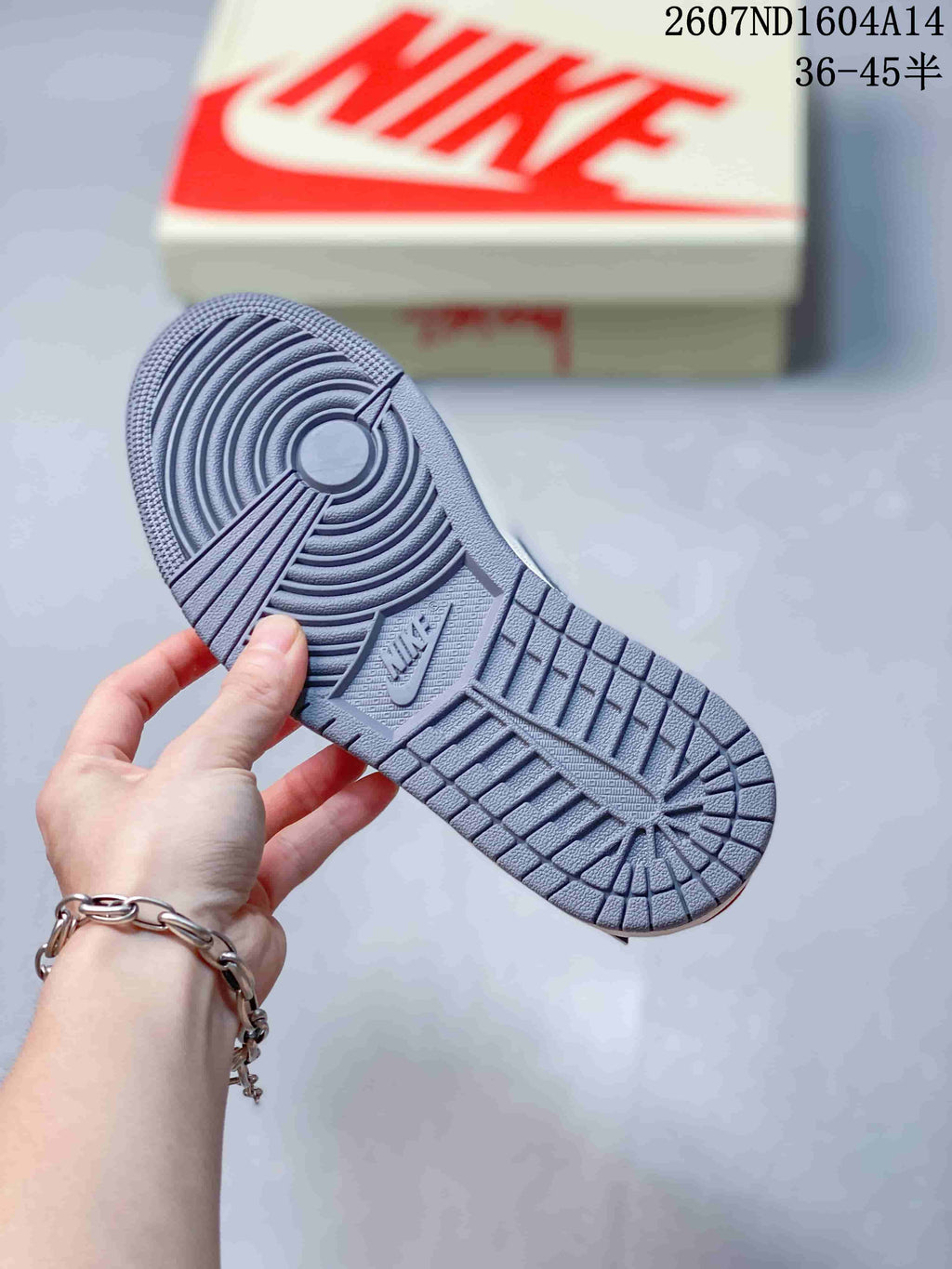 Nike SB Dunk Low Sneakers in Gray and Off-White 2607ND1604A14 - product image from the listing.