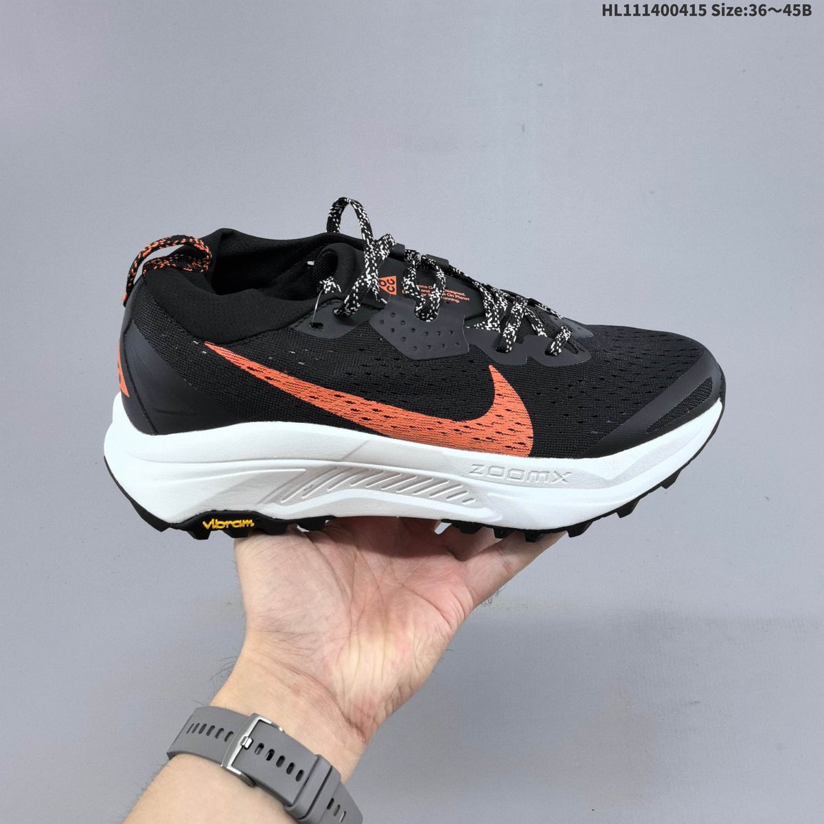 Nike ACG Zegama Trail Running Shoes, in Black and Orange - product image from the listing.