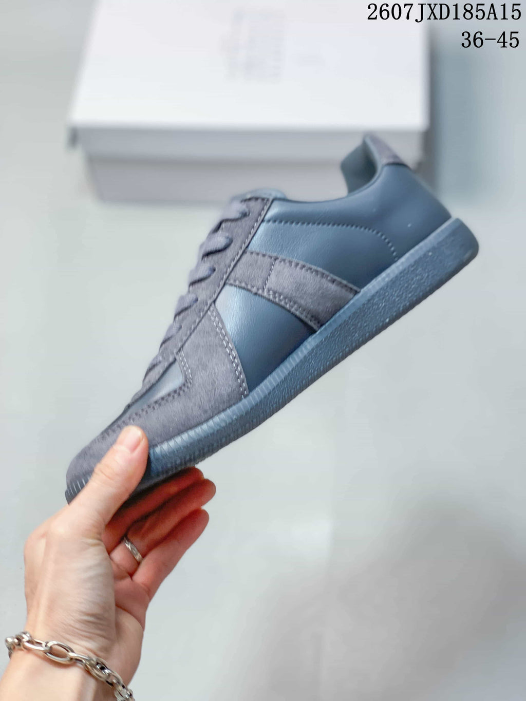 Maison Margiela S57WS0236 Low-Top Sneakers in Gray - product image from the listing.